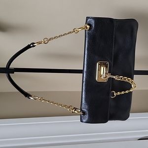 Michael Kors Black Leather clutch with golden chain